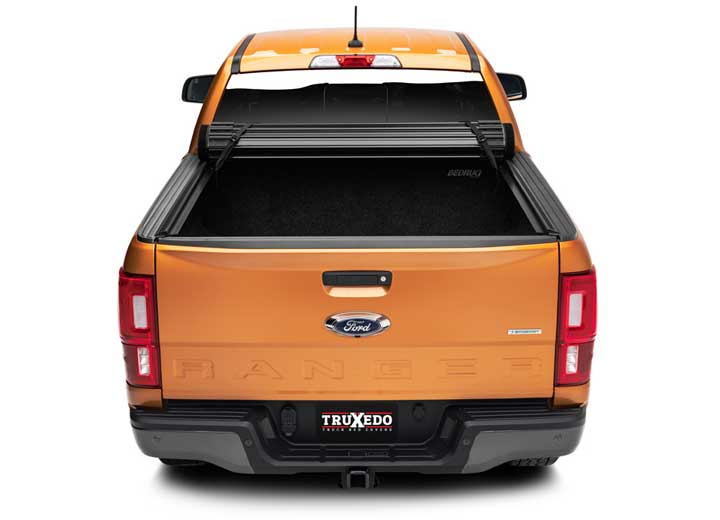 TruXedo Sentry CT hard roll-up tonneau cover rolled forward to the cab on a 2019-2023 Ford Ranger, straight rear view