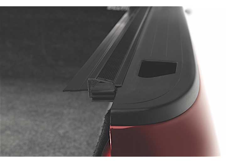 Close-up of the side rail on a TruXedo Sentry CT hard roll-up tonneau cover