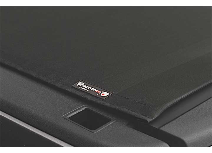 Close-up of the TruXedo name plate on the cover on a TruXedo Sentry CT hard roll-up tonneau cover