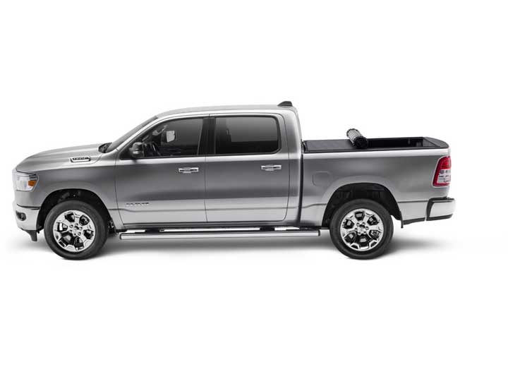 TruXedo Sentry hard roll-up tonneau cover rolled partway open on a 2019-2024 Ram 1500, side profile