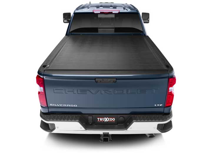 TruXedo Sentry hard roll-up tonneau cover closed over the bed of a pickup truck, straight rear view