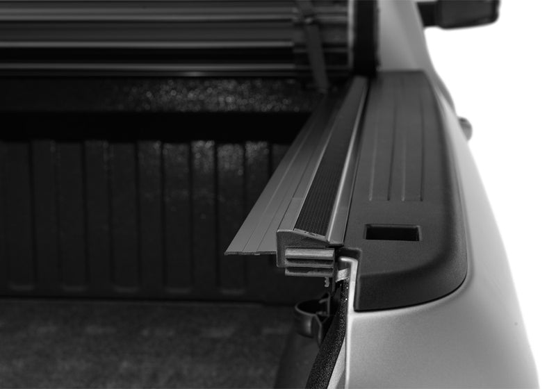 Close-up of the side rail on a TruXedo Sentry hard roll-up tonneau cover