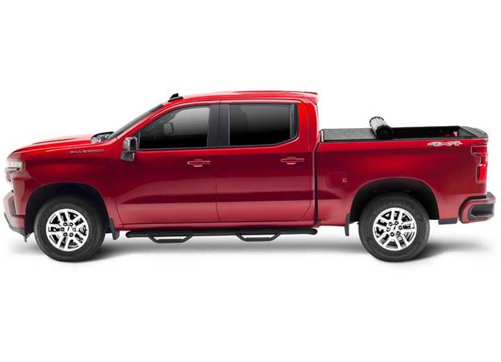 TruXedo Sentry hard roll-up tonneau cover rolled partway open over the bed of a pickup truck, side profile