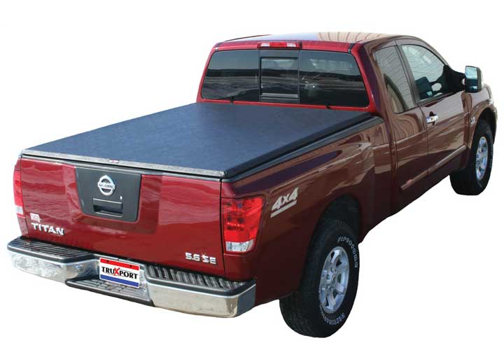 TruXedo TruXport soft roll-up tonneau cover closed on a 2004-2015 Nissan Titan, rear three-quarter view
