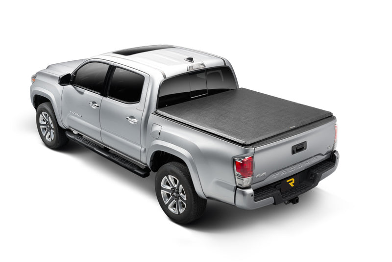 TruXedo TruXport soft roll-up tonneau cover closed on a 2016-2023 Toyota Tacoma, widest view