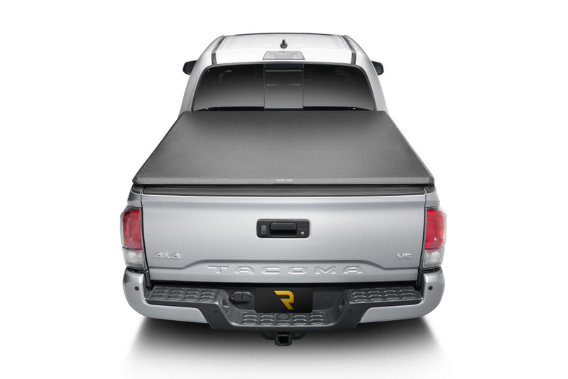 TruXedo TruXport soft roll-up tonneau cover closed on a 2016-2023 Toyota Tacoma, straight rear view
