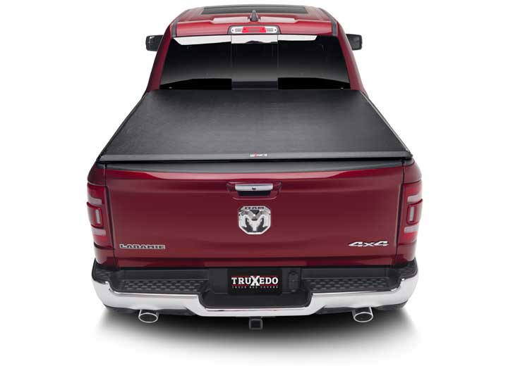TruXedo TruXport soft roll-up tonneau cover closed on a 2019-2024 Ram 1500, straight rear view
