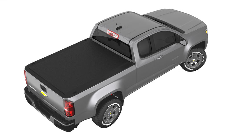 TruXedo TruXport soft roll-up tonneau cover closed over the bed of a pickup truck, widest view