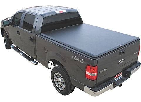 TruXedo TruXport soft roll-up tonneau cover closed over the bed of a pickup truck, widest view