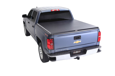 TruXedo TruXport soft roll-up tonneau cover closed over the bed of a pickup truck, widest view