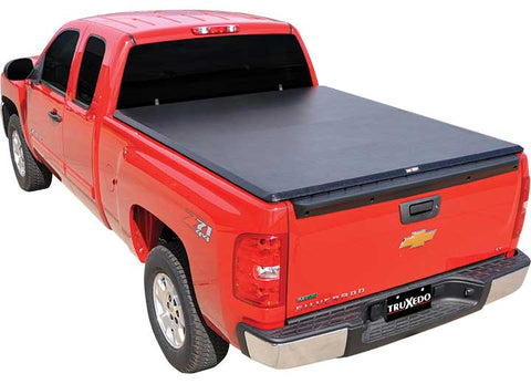 TruXedo TruXport soft roll-up tonneau cover closed over the bed of a pickup truck, widest view