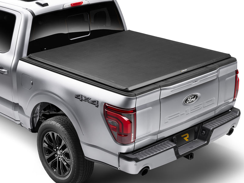 TruXedo TruXport soft roll-up tonneau cover closed over the bed of a pickup truck, widest view