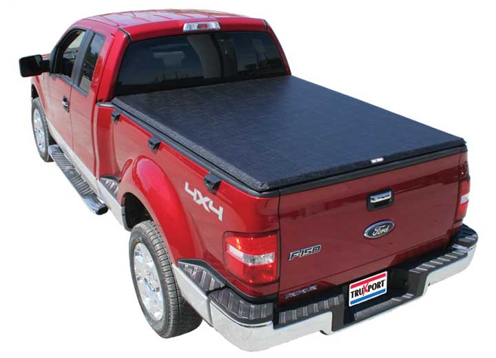 TruXedo TruXport soft roll-up tonneau cover closed over the bed of a pickup truck, rear three-quarter view