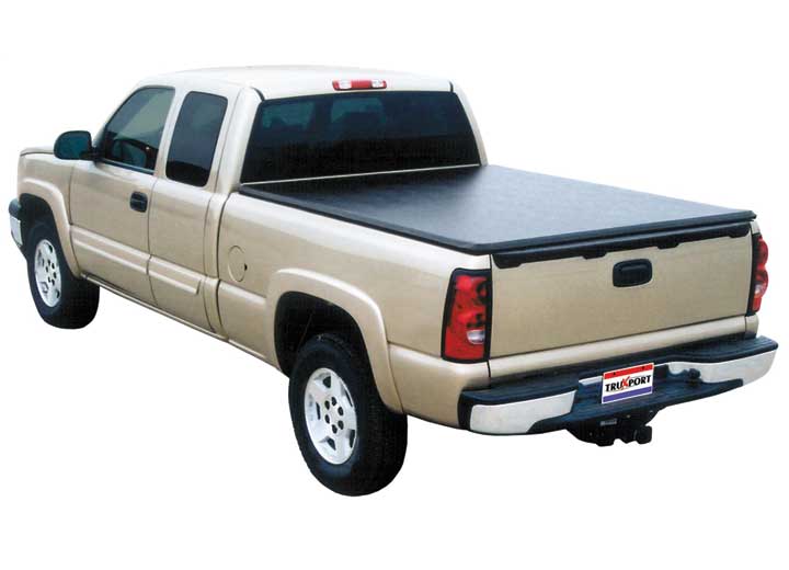 TruXedo TruXport soft roll-up tonneau cover closed over the bed of a pickup truck, rear three-quarter view