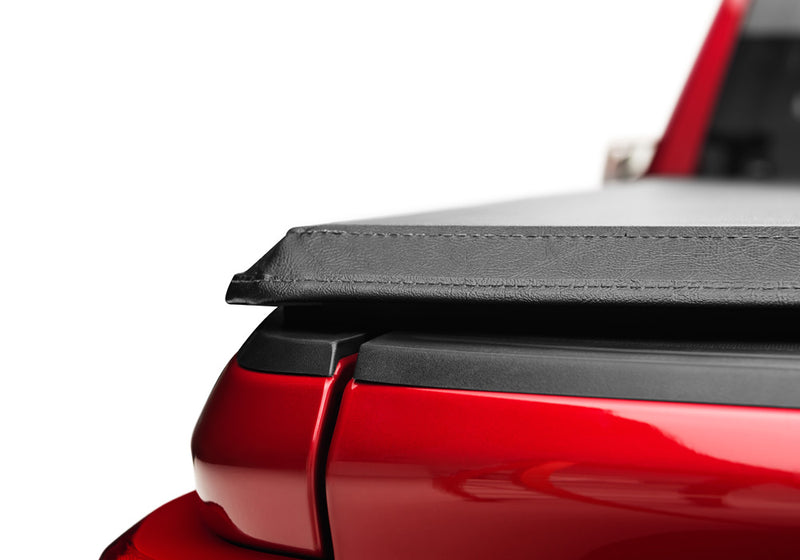 Close-up of the side edge of the cover on a TruXedo TruXport soft roll-up tonneau cover