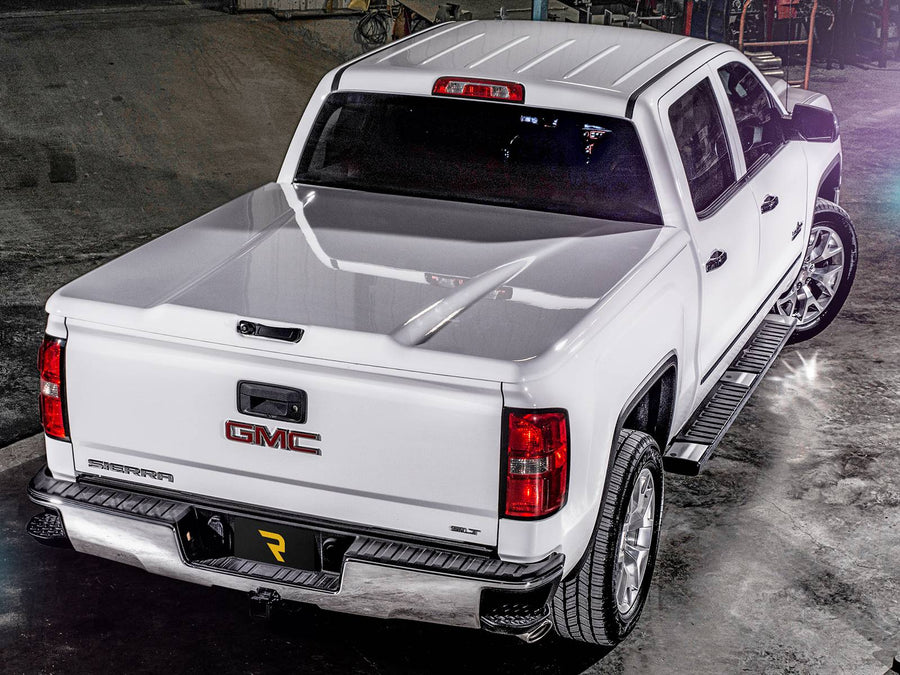 UnderCover Elite LX one-piece tonneau cover closed over the bed, finished to match the truck's paint