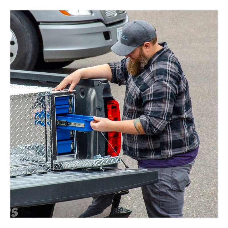 UWS 18" Drawer Truck Tool Box, Bright Aluminum mounted in a truck bed with its drawers slid open and loaded with tools