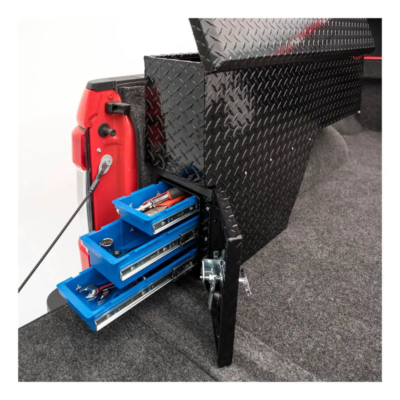 UWS 48" Driver-Side Wheel Well Truck Tool Box with Drawers, Gloss Black mounted in a truck bed with its drawers slid open and loaded with tools