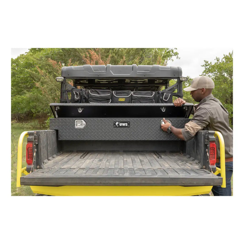 UWS 59" UTV Crossbed Tool Box shown installed on a Can-Am Defender, the platform this part's bracket kit serves (view 2)