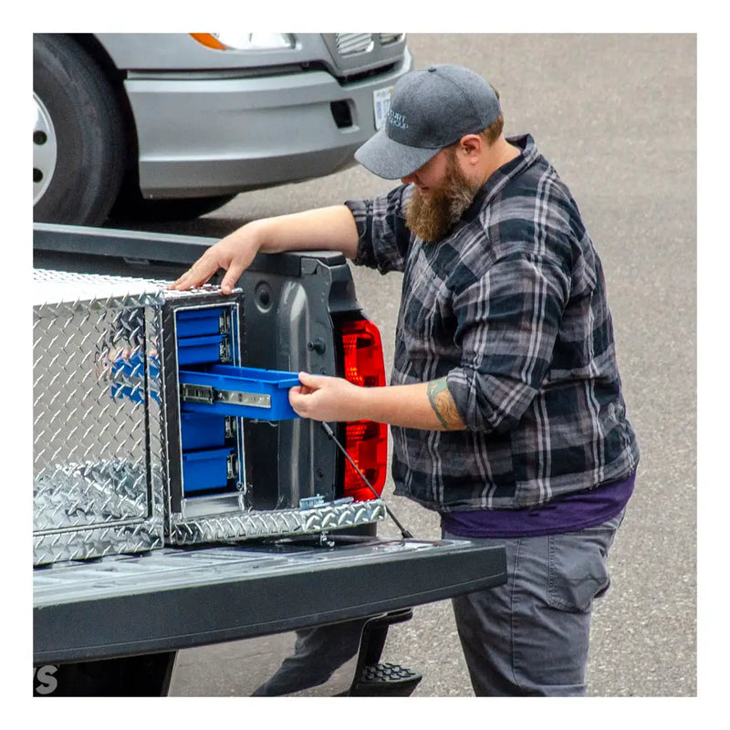 UWS EC20041 22" truck tool box in bright aluminum, the box in use in a truck bed