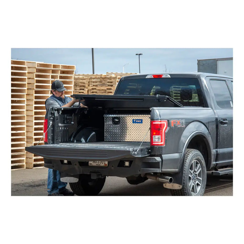 UWS 48" Under Tonneau Chest Box in Bright Aluminum, in-use photograph on a working truck