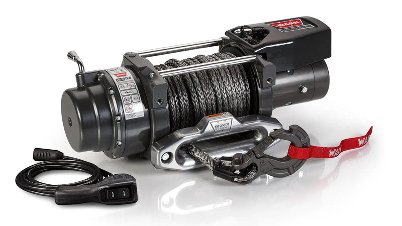 Warn 16.5ti-S winch, three-quarter view on white, showing the free-spool clutch lever, synthetic rope, aluminum hawse fairlead, EPIC hook and the wired thermometric remote