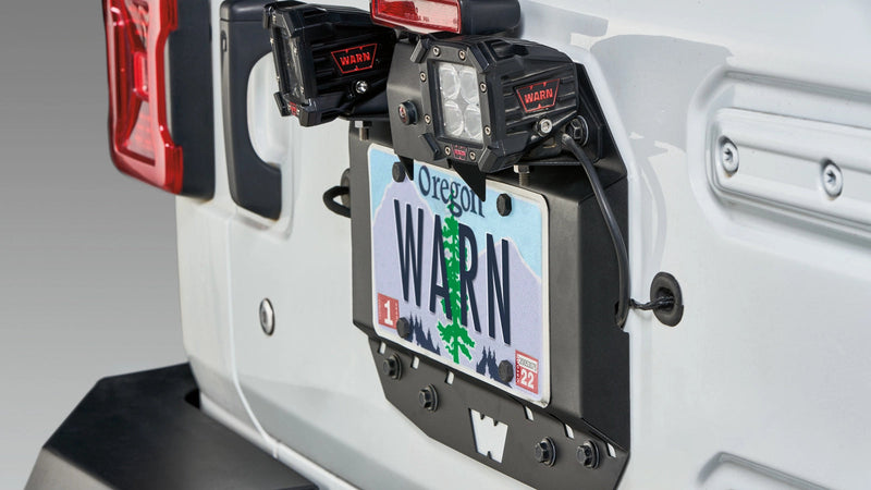 Warn Rear Tire Delete Plate for 2018-2026 Jeep Wrangler, close-up on the tailgate