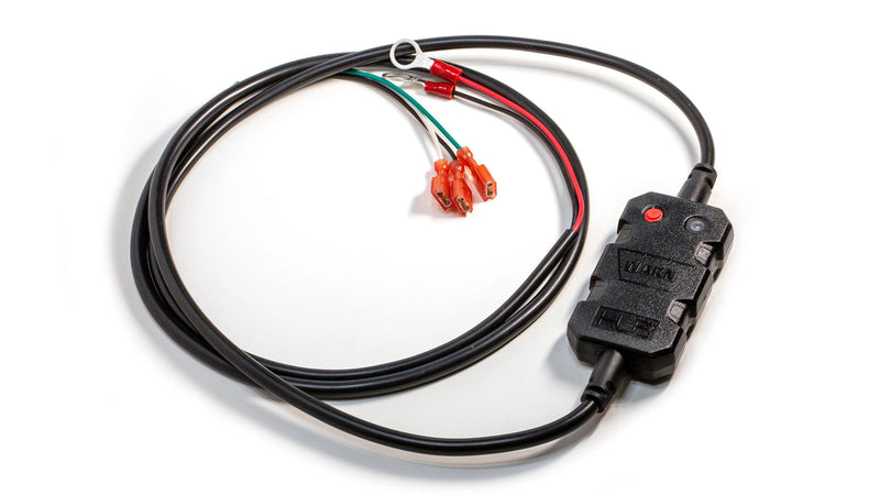 Warn HUB wireless receiver, a small moulded black module with a red pairing button and a status LED, on a coiled harness whose leads end in a ring terminal and three insulated spade connectors