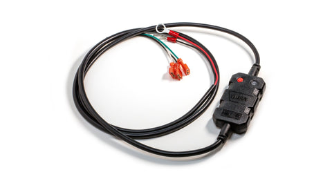 Warn HUB wireless receiver, a small moulded black module with a red pairing button and a status LED, on a coiled harness whose leads end in a ring terminal and three insulated spade connectors