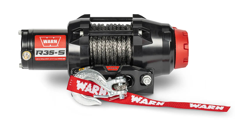Warn R35-S powersports winch, front elevation on white, showing synthetic rope on the drum, the hawse fairlead and the hook with its red Warn strap