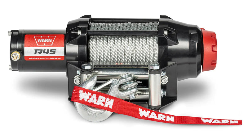 Warn R45 powersports winch, front elevation on white, showing steel wire rope on the drum, the roller fairlead and the hook with its red Warn strap