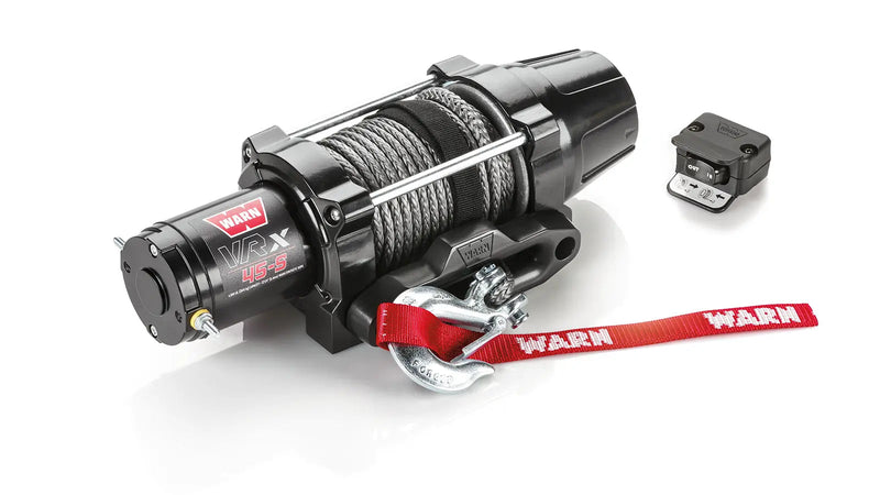 Warn VRX 45-S powersports winch, three-quarter view on white, shown with the dash-mounted rocker control switch and corded remote supplied with it