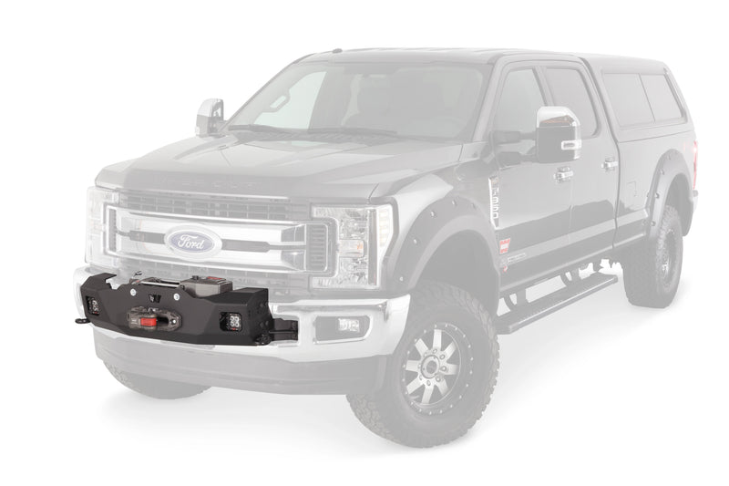 Warn Trans4mer Gen III Series Winch Carrier Kit for 2017-2026 Ford/Ram (multiple models), shown on a Ford Super Duty with the vehicle faded out
