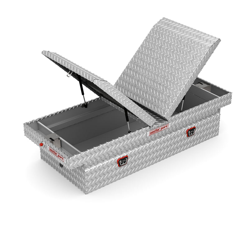 Weather Guard 114-0-04 gull-wing crossover box in bright aluminum diamond plate, one lid raised on its gas strut, showing the interior and the center divider