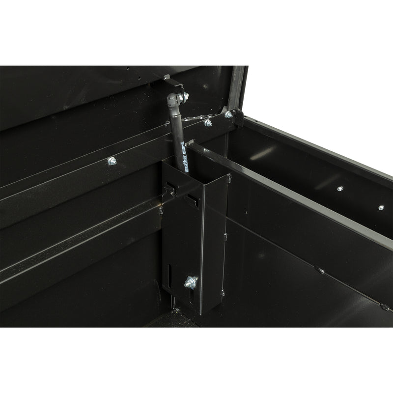 Weather Guard 116-5-04 crossover saddle box in gloss black, close-up of the welded gas strut shield inside the body