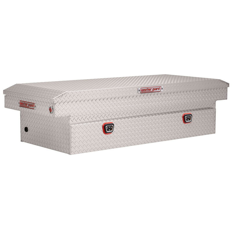 Weather Guard 117-0-04 crossover saddle box in bright aluminum diamond plate, front three-quarter studio view with the lid closed