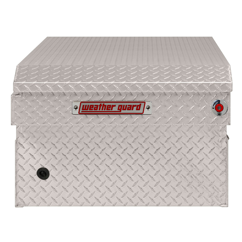Weather Guard 117-0-04 crossover saddle box in bright aluminum diamond plate, side profile showing the body depth and the bed-rail notch
