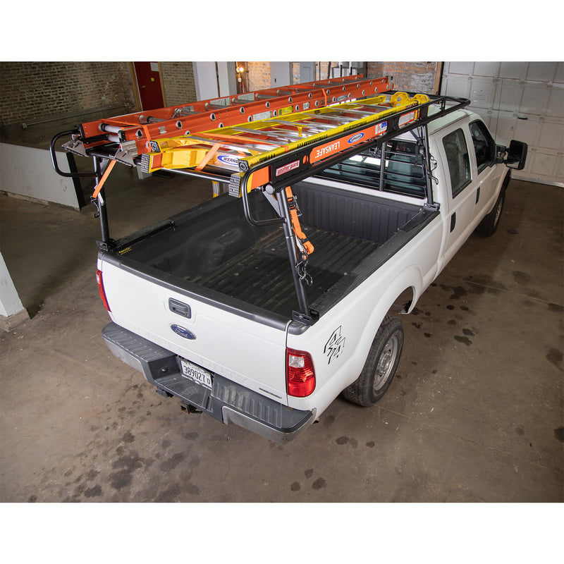 Weather Guard heavy-duty truck rack carrying several ladders with the full accessory set fitted