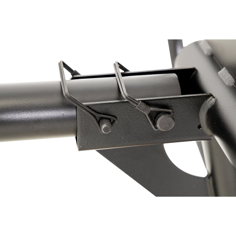 Close-up of a rear accessory support clamped to the top rail of the heavy-duty truck rack