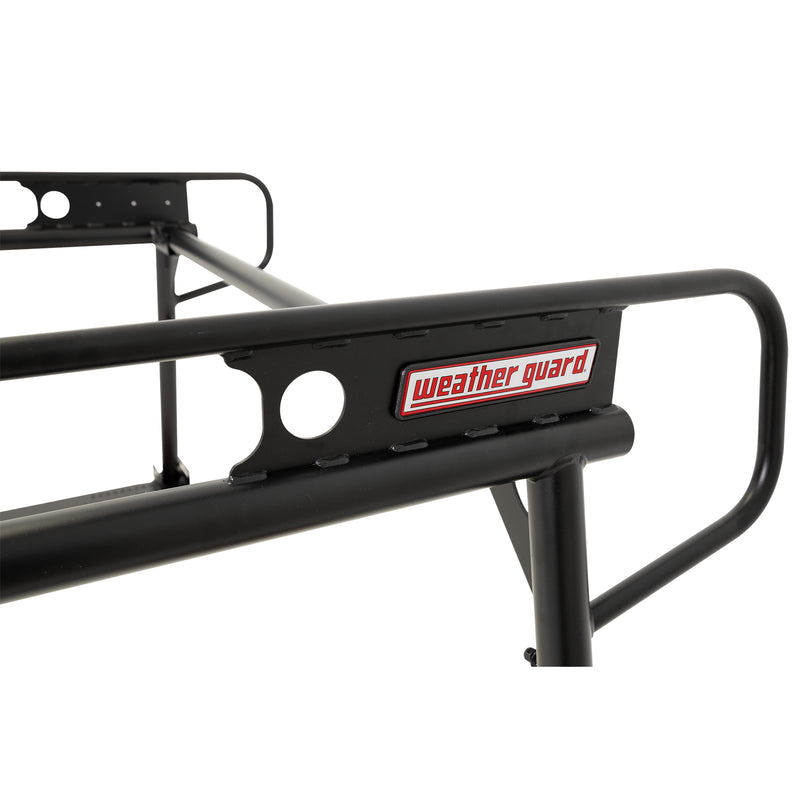 Detail of the rear frame section and weather guard badge on the heavy-duty steel truck rack
