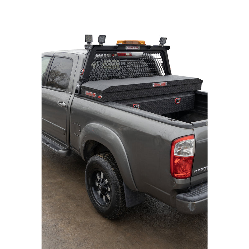 Rear three-quarter view of a silver Toyota Tundra fitted with the Weather Guard hex headache rack