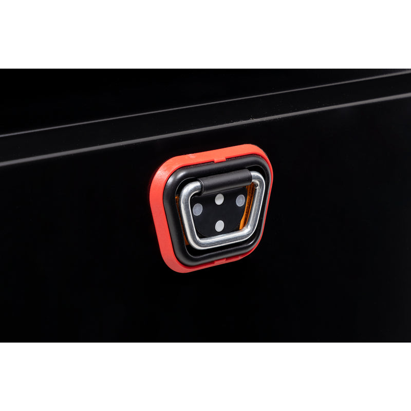 Weather Guard 120-5-04 crossover saddle box in gloss black, close-up of the reinforced tie-down buckle on the body