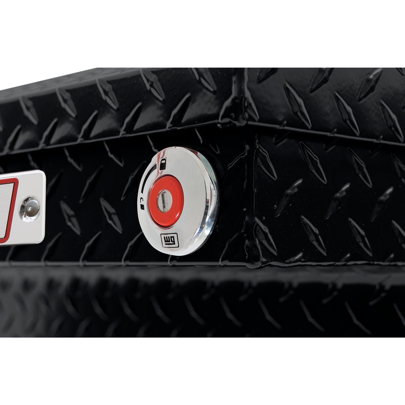 Weather Guard 121-5-04 crossover saddle box in gloss black, close-up of the red push-button lock and Weather Guard badge
