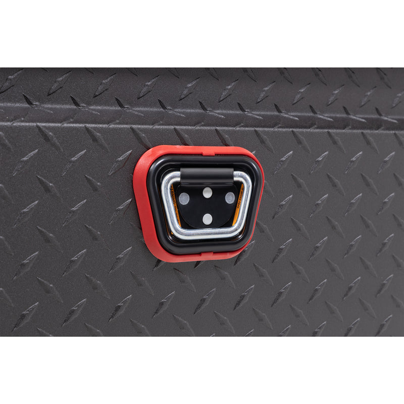 Weather Guard 121-52-04 crossover saddle box in textured matte black, close-up of the reinforced tie-down buckle on the body