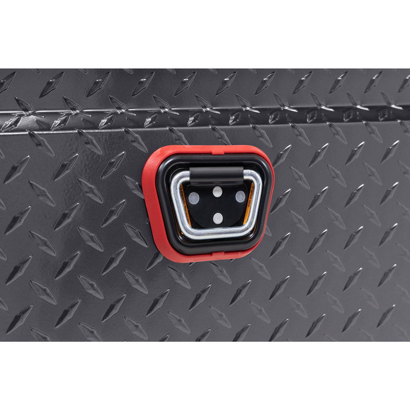 Weather Guard 121-6-04 crossover saddle box in gunmetal gray, close-up of the reinforced tie-down buckle on the body