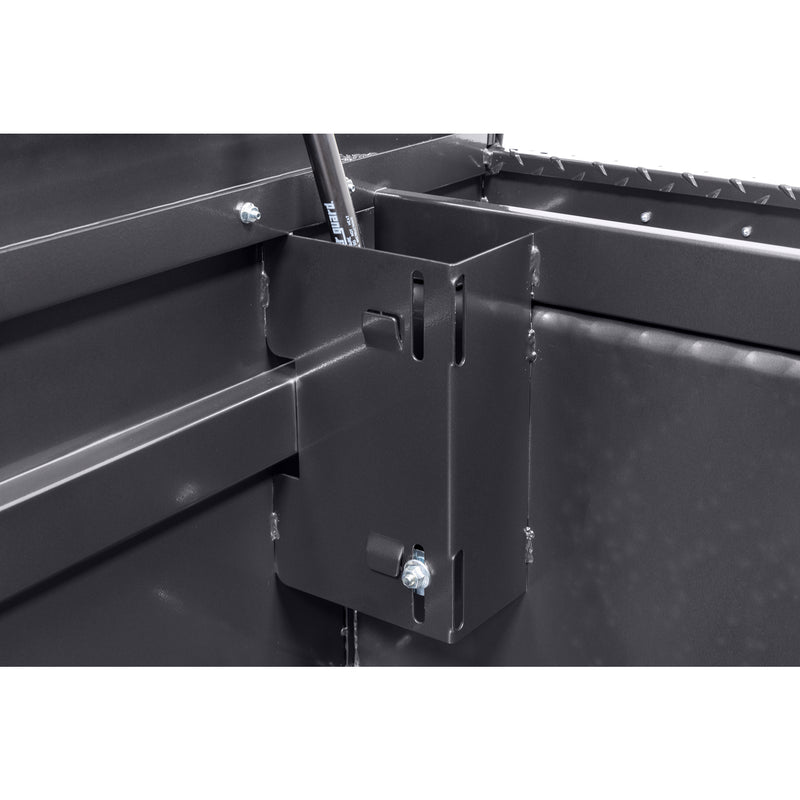 Weather Guard 121-6-04 crossover saddle box in gunmetal gray, close-up of the welded gas strut shield inside the body
