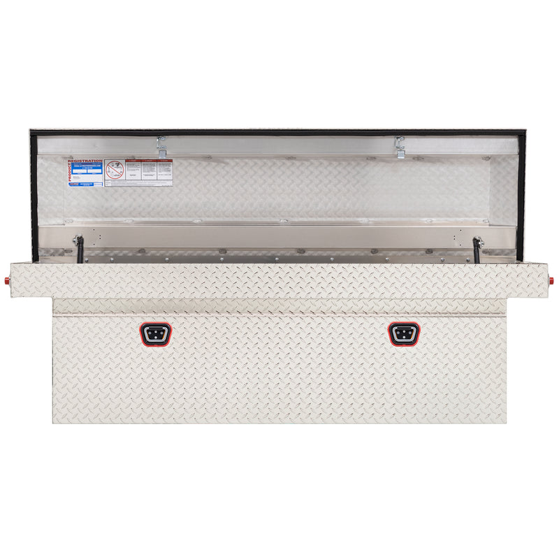 Weather Guard 123-0-04 crossover saddle box in bright aluminum diamond plate, straight-on front view with the lid open, showing the full interior