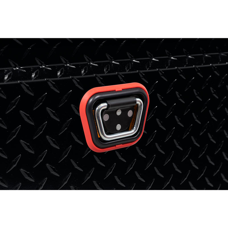 Weather Guard 123-5-04 crossover saddle box in gloss black, close-up of the reinforced tie-down buckle on the body