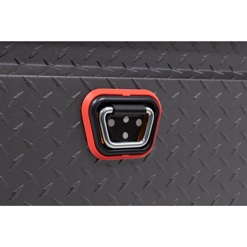 Weather Guard 123-52-04 crossover saddle box in textured matte black, close-up of the reinforced tie-down buckle on the body