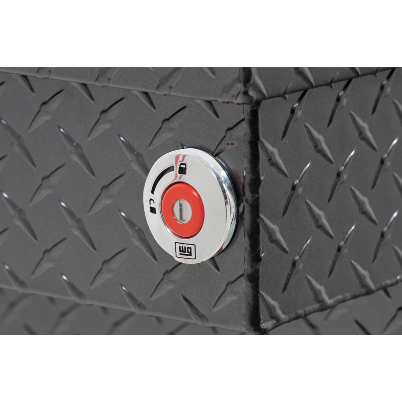 Weather Guard 123-6-04 crossover saddle box in gunmetal gray, close-up of the red push-button lock and Weather Guard badge